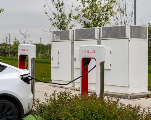 53225208 tesla electric vehicle charging station on motorway in uk