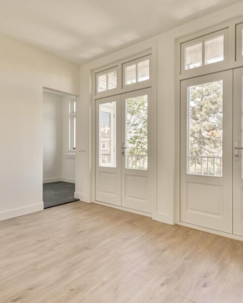Empty room with window and radiator