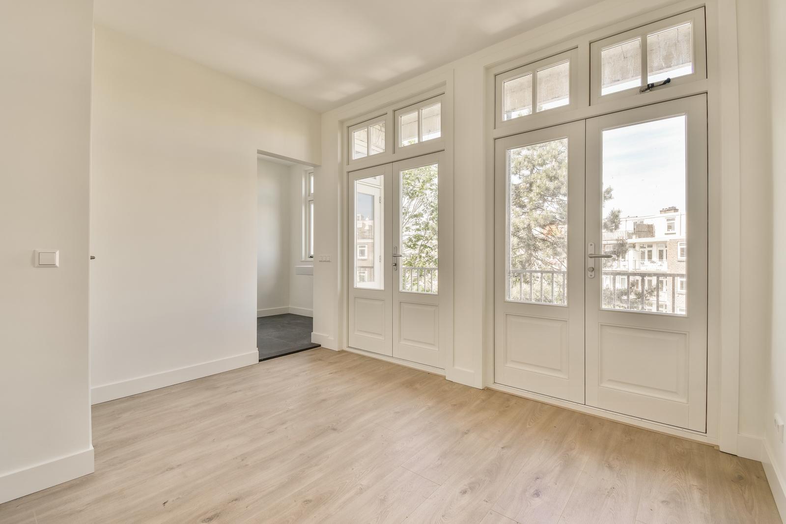 Empty room with window and radiator